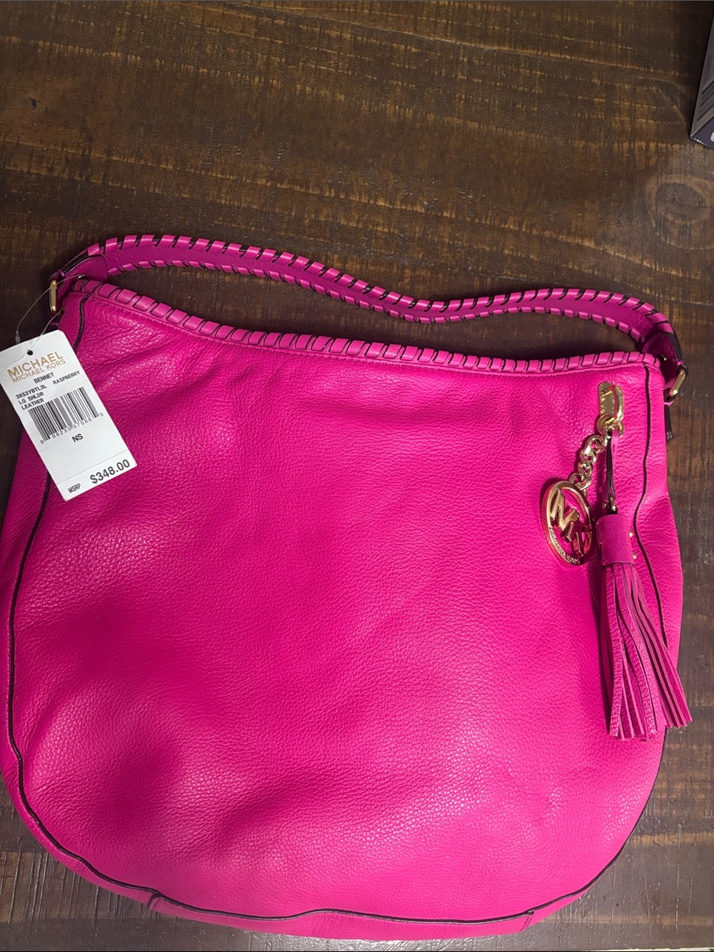 Michael Kors Hot Pink Leather Shoulder Hobo with Tassel Charm